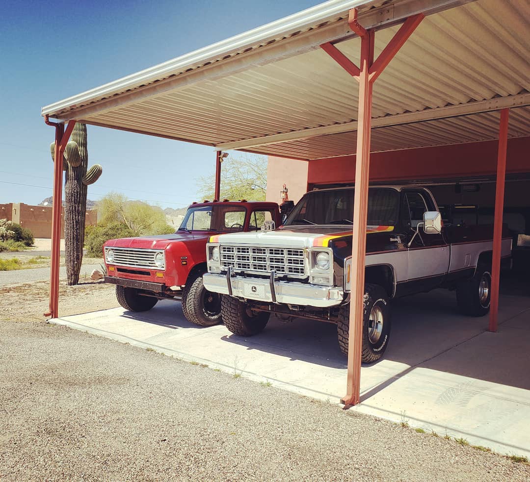 Classic Chevy 4x4 Trucks Parked Under a Carport. Photo by Instagram user @classicridesaz