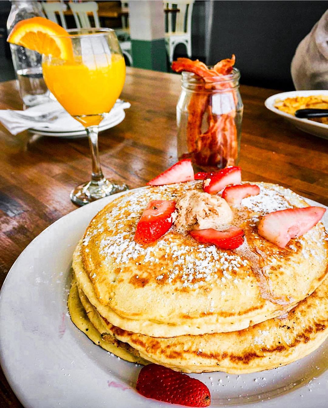 Stack of Pancakes with Strawberries on Top. Photo by Instagram User @ironroosterallday