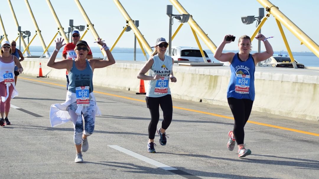 Three Women Running in the Skyway 10K in St. Petersburg, FL. Photo by Instagram user @skyway10k