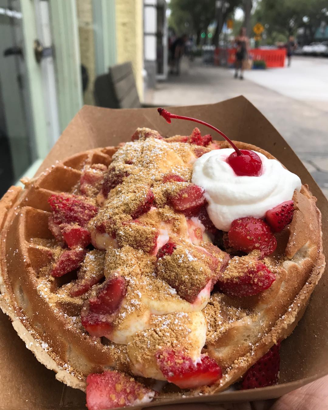 Belgian Waffle Covered in Strawberries and Cream. Photo by Instagram user @foodlife_tampabay