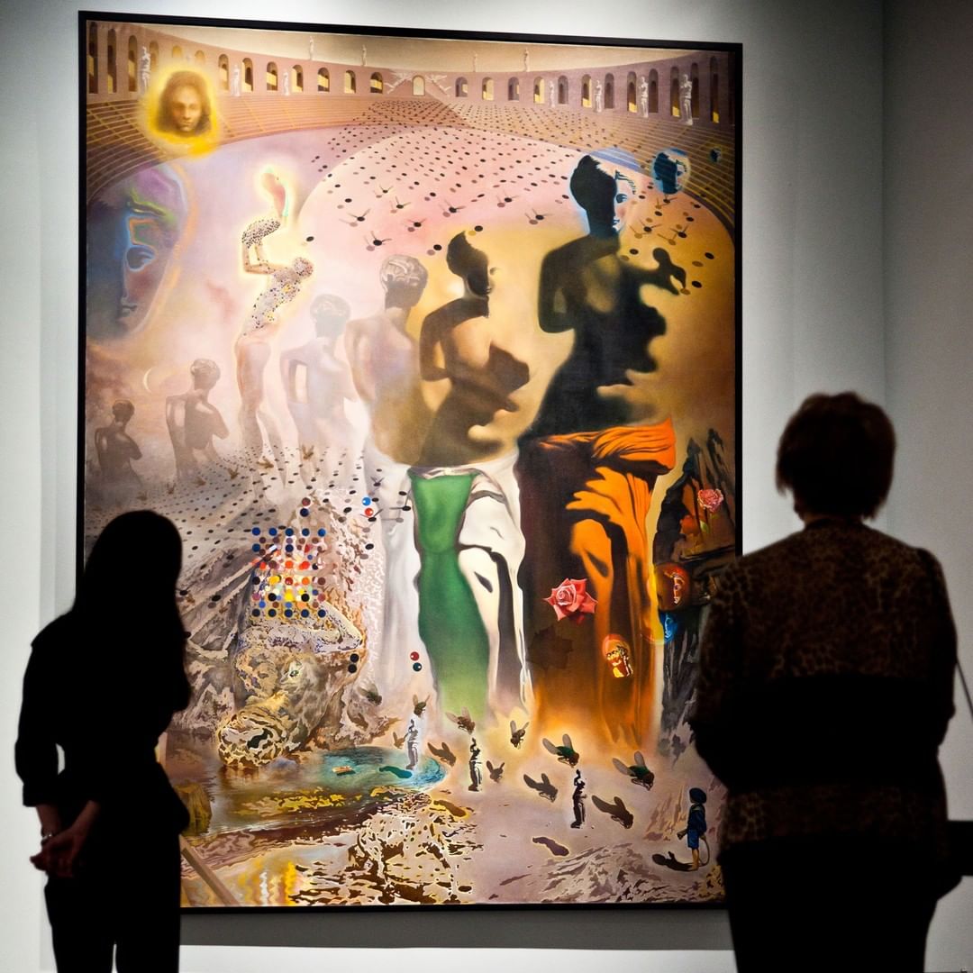 People Looking at a Dali Painting Inside the Dali Museum. Photo by Instagram user @dalimuseum