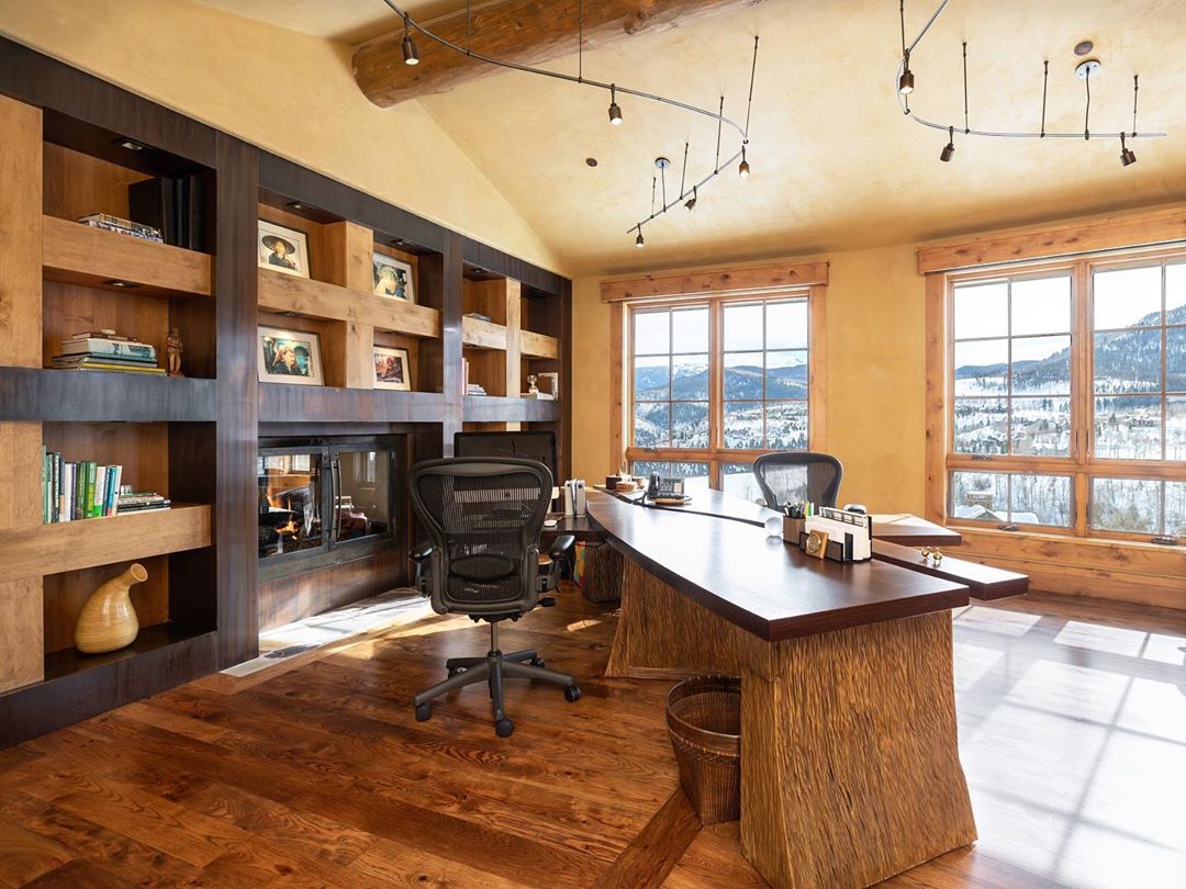 Home Office Built to Look Like it's Inside of a Cabin with Reclaimed Wood Everywhere. Photo by Instagram user @bjornbauerarchitecture