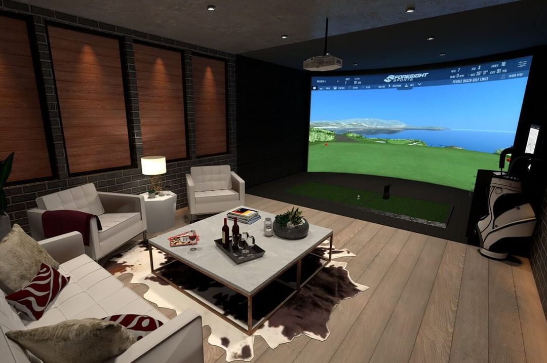 Basement Golf Simulator Room. Photo by Instagram user @rainorshinegolf