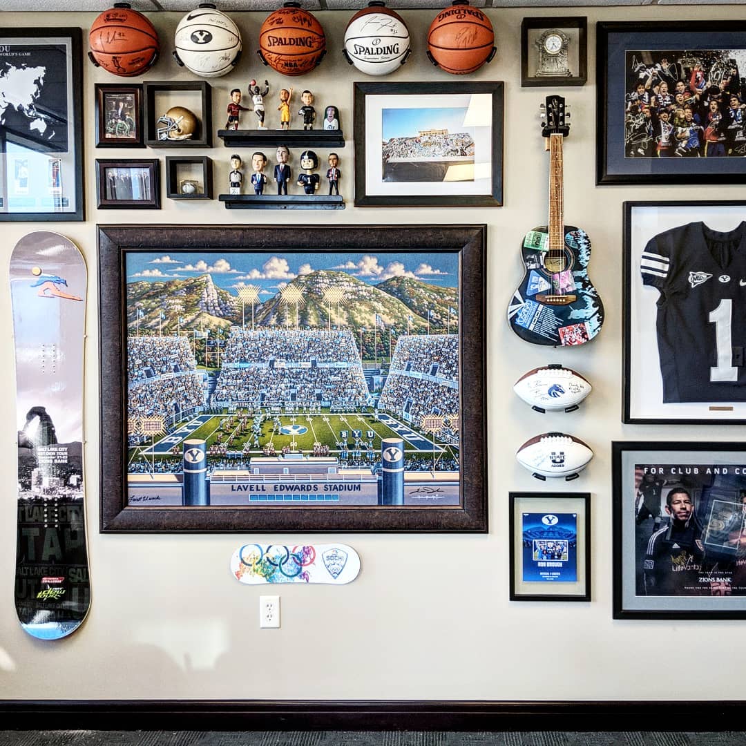 Wall with Lots of BYU Memorabilia. Photo by Instagram user @editdesignhouse