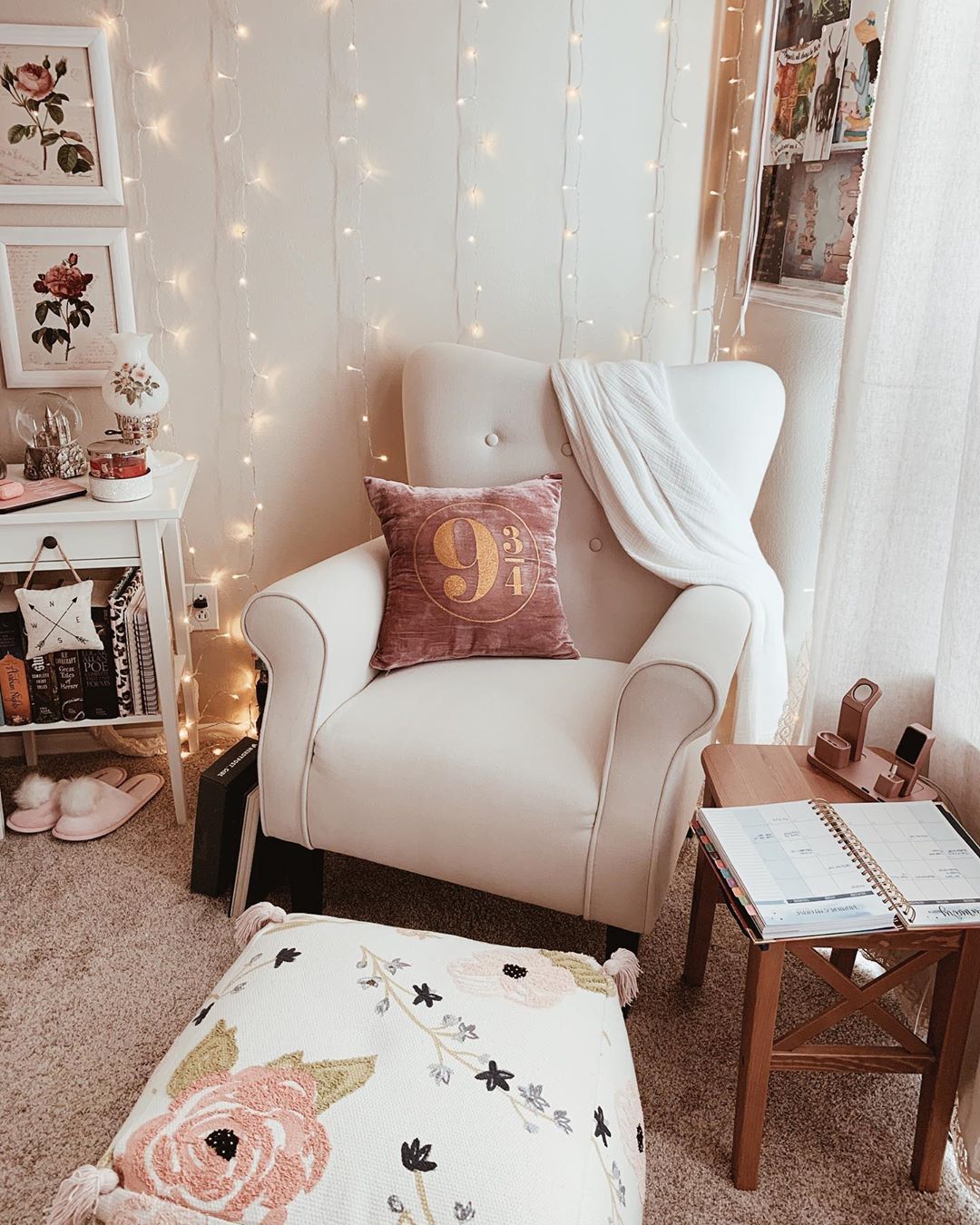 Reading Chair Set Up with Harry Potter Themed Pillow and White Blanket with String Lights on the Wall. Photo by Instagram user @everlasting.charm