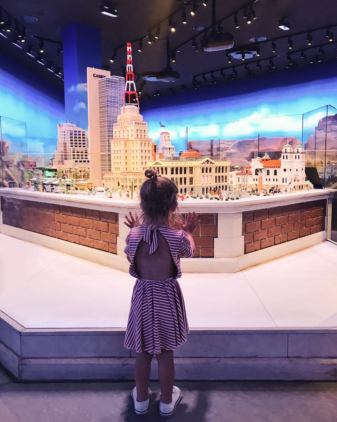 Little Girl Looking at a Downtown Tempe Made of LEGO. Photo by Instagram user @kcstauffer