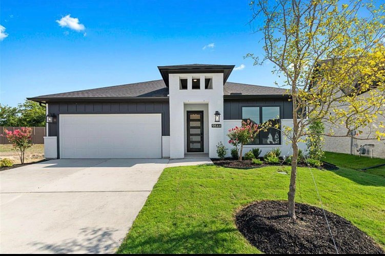 Modern White And Black Ranch House in Benbrook, TX. Photo by Instagram user @twana_therealtor