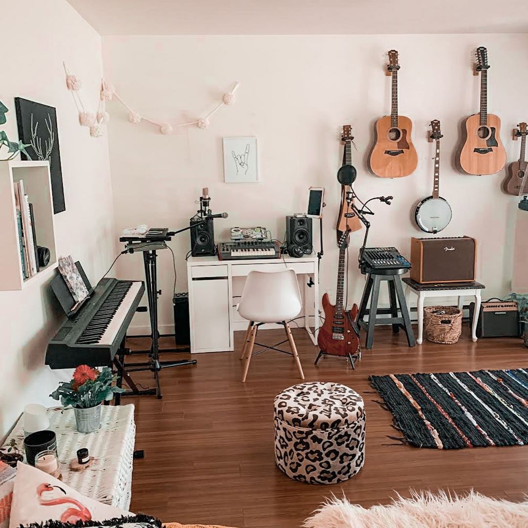 She Shed Music Studio Space with Guitars on the Wall. Photo by Instagram user @sallywallick