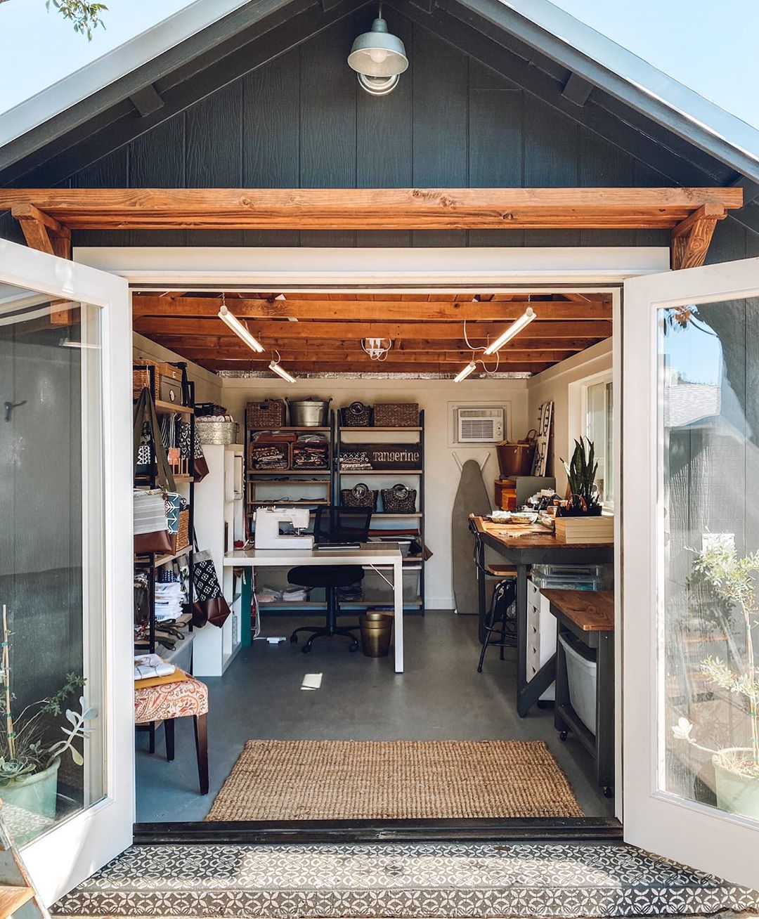 She Shed Filled with a Crafting Area and Table. Photo by Instagram user @sweettangerinechico