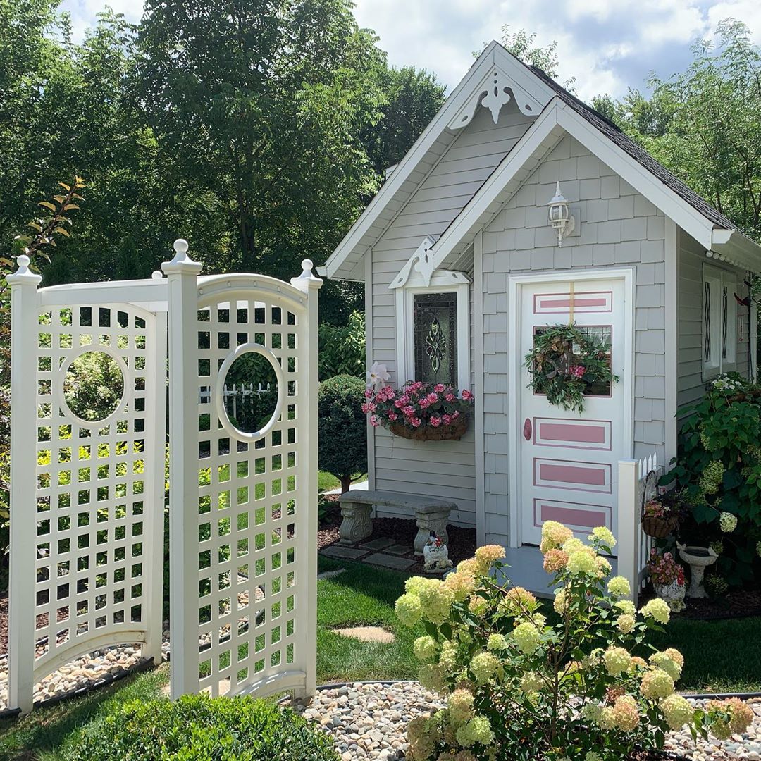 Gray She Shed with Pink Accents. Photo by Instagram user @captjenlobb