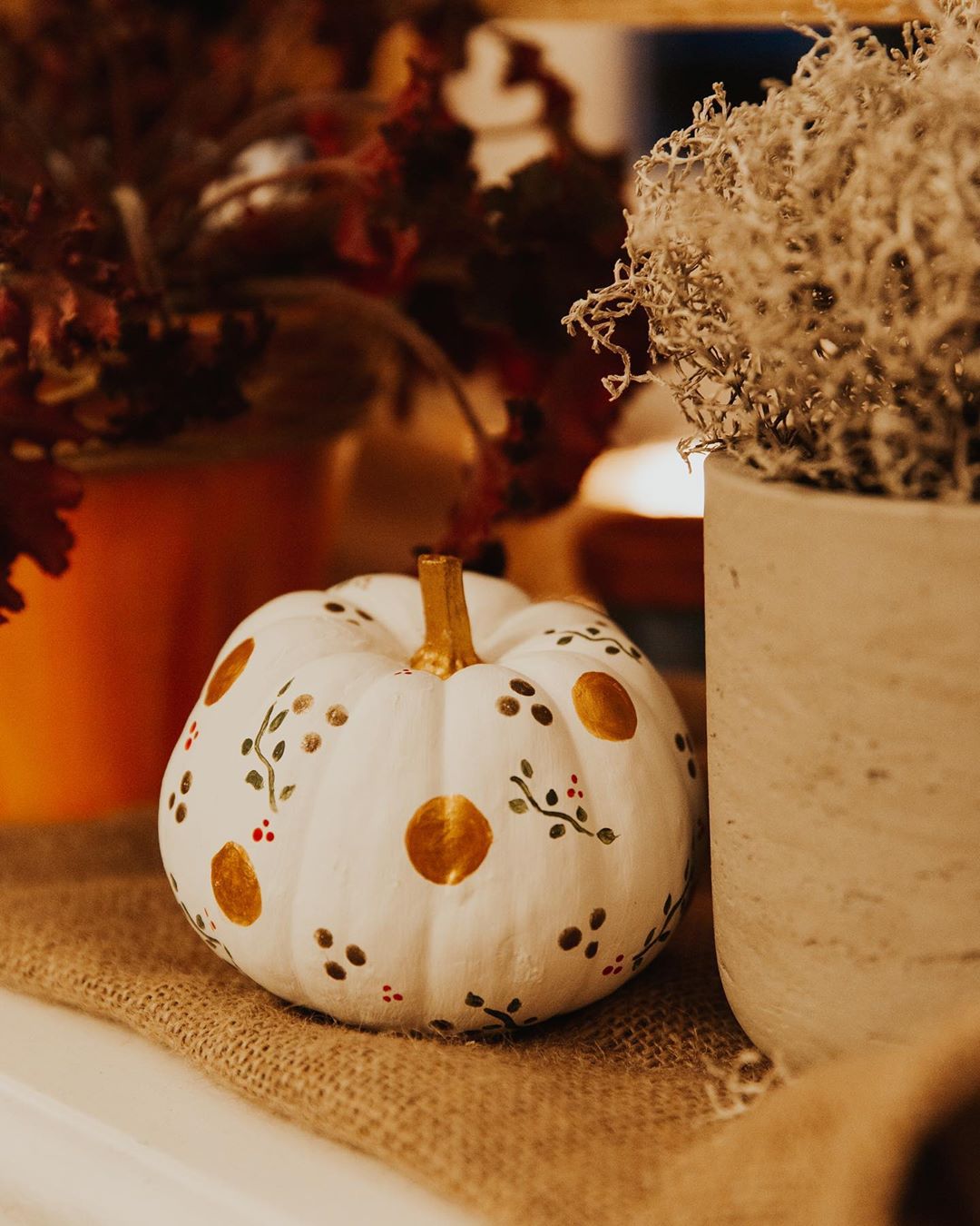Pumpkin Painted White with Gold Circles. Photo by Instagram user @jessiewhealy