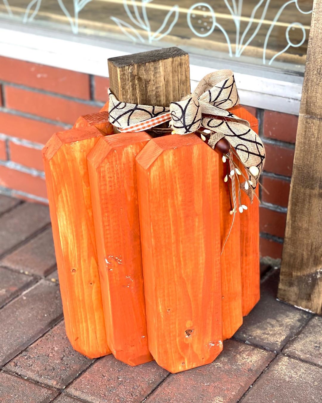 Pieces of Wood Nailed Together to Look like a Pumpkin. Photo by Instagram user @thesassycownc