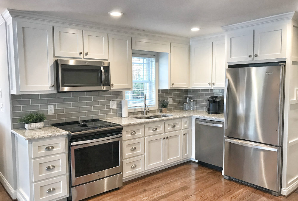 Updated Kitchen with White Cabinets, New Hardware, and Energy Saving Appliances