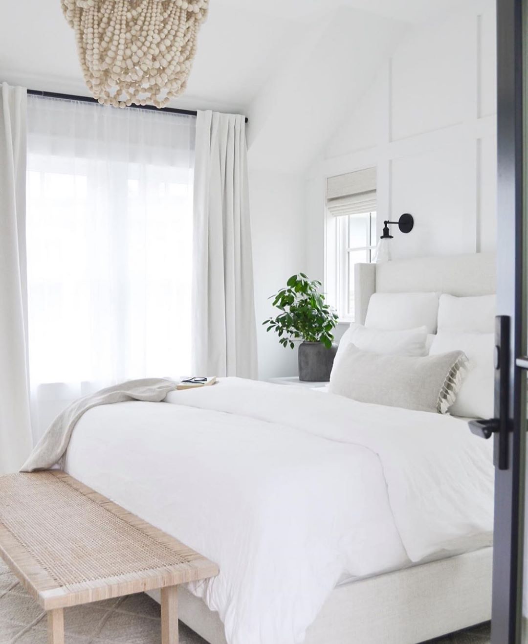 All White Bedroom with White Linens. Photo by Instagram user @simplifycohost
