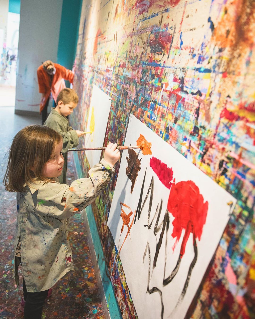 Two Girls Painting on the Wall at Minnesota Children's Museum. Photo by Instagram user @mnchildmuseum