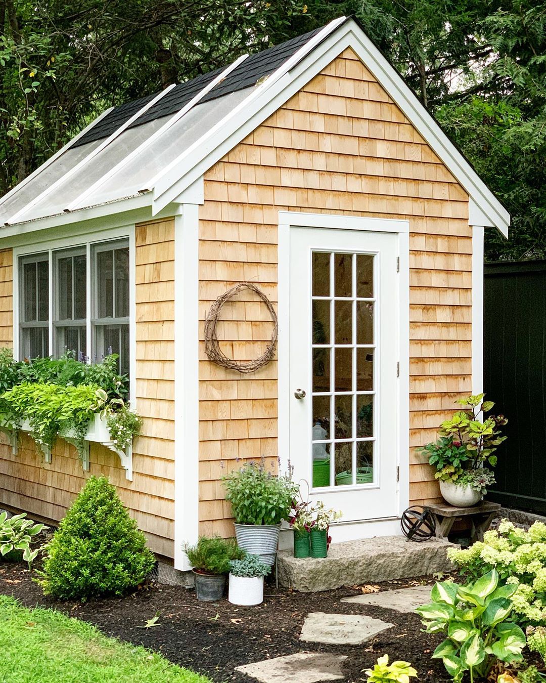 Backyard She Shed with Wooden Shingle Siding. Photo by Instagram user @thistlecontainers