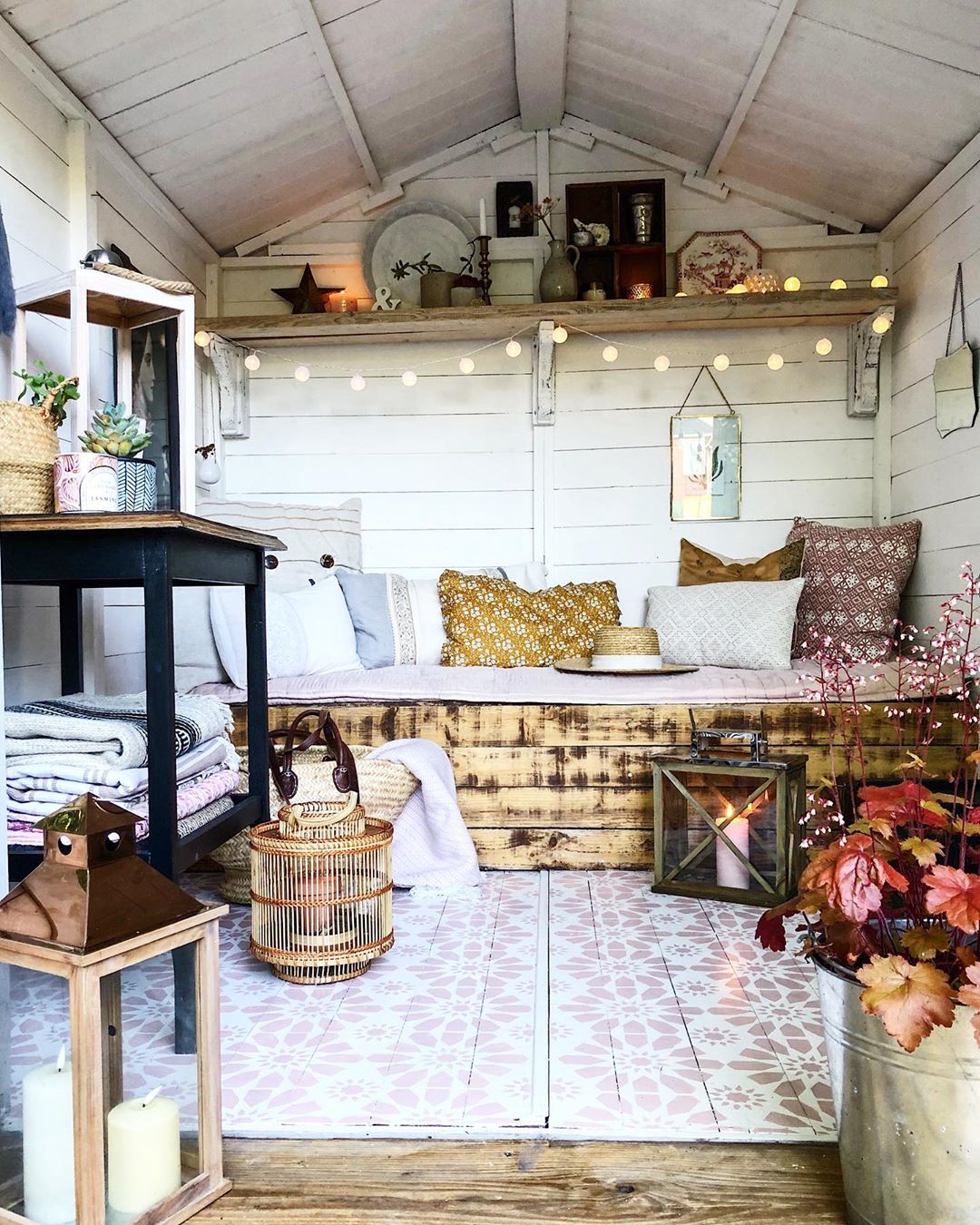 Backyard Reading Space with a Large Bench Seating. Photo by Instagram user @theresa_gromski