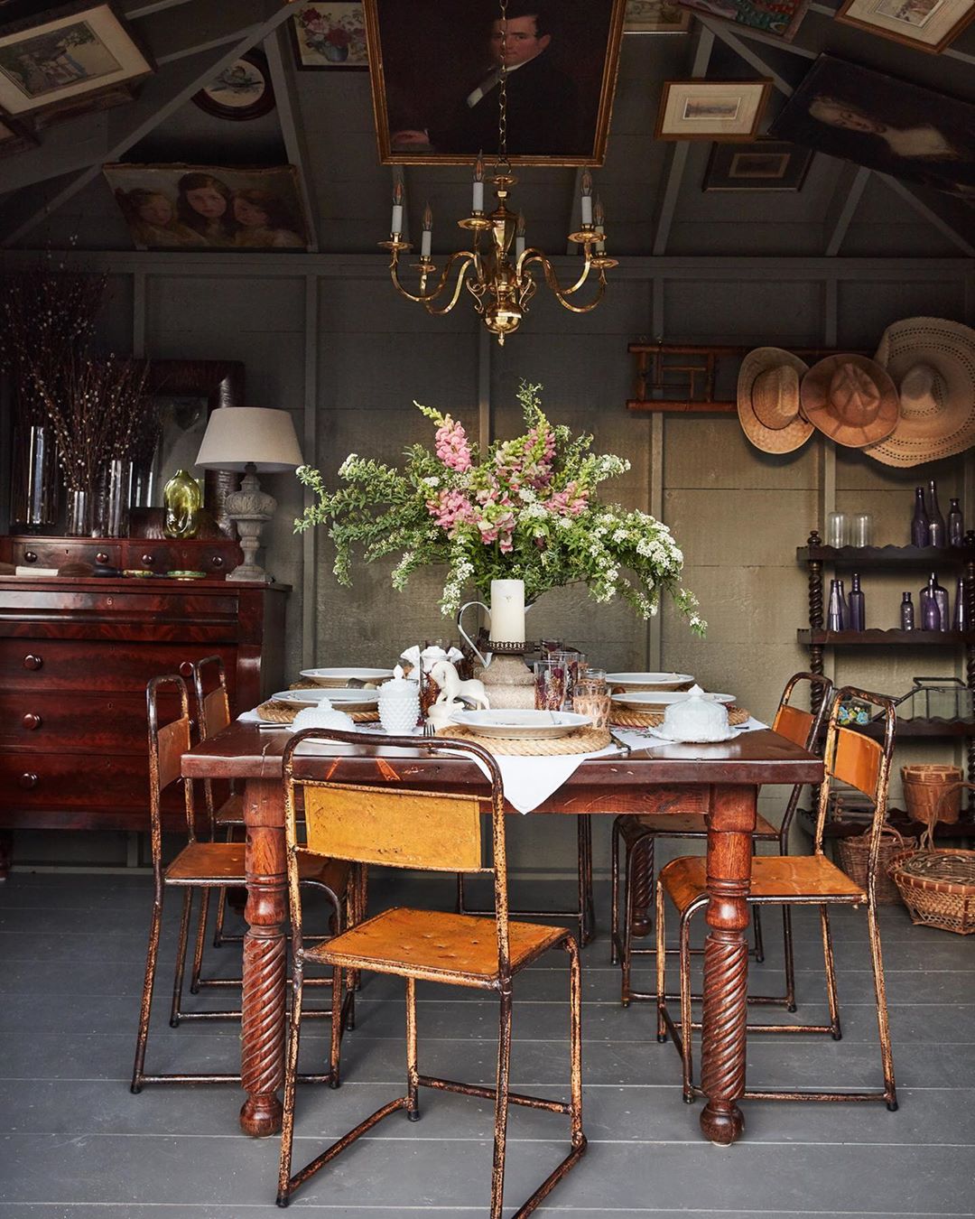 She Shed Dining Space Set Up with Antique Dining Room Table and Chairs. Photo by Instagram user @georgantas.design