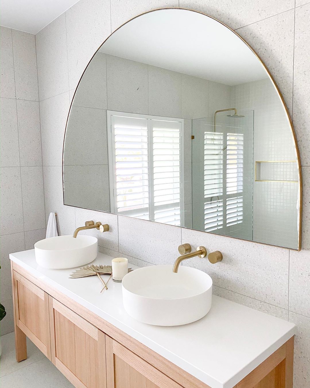 Large Bathroom Halfmoon Mirror. Photo by Instagram user @the_coastalbarndream