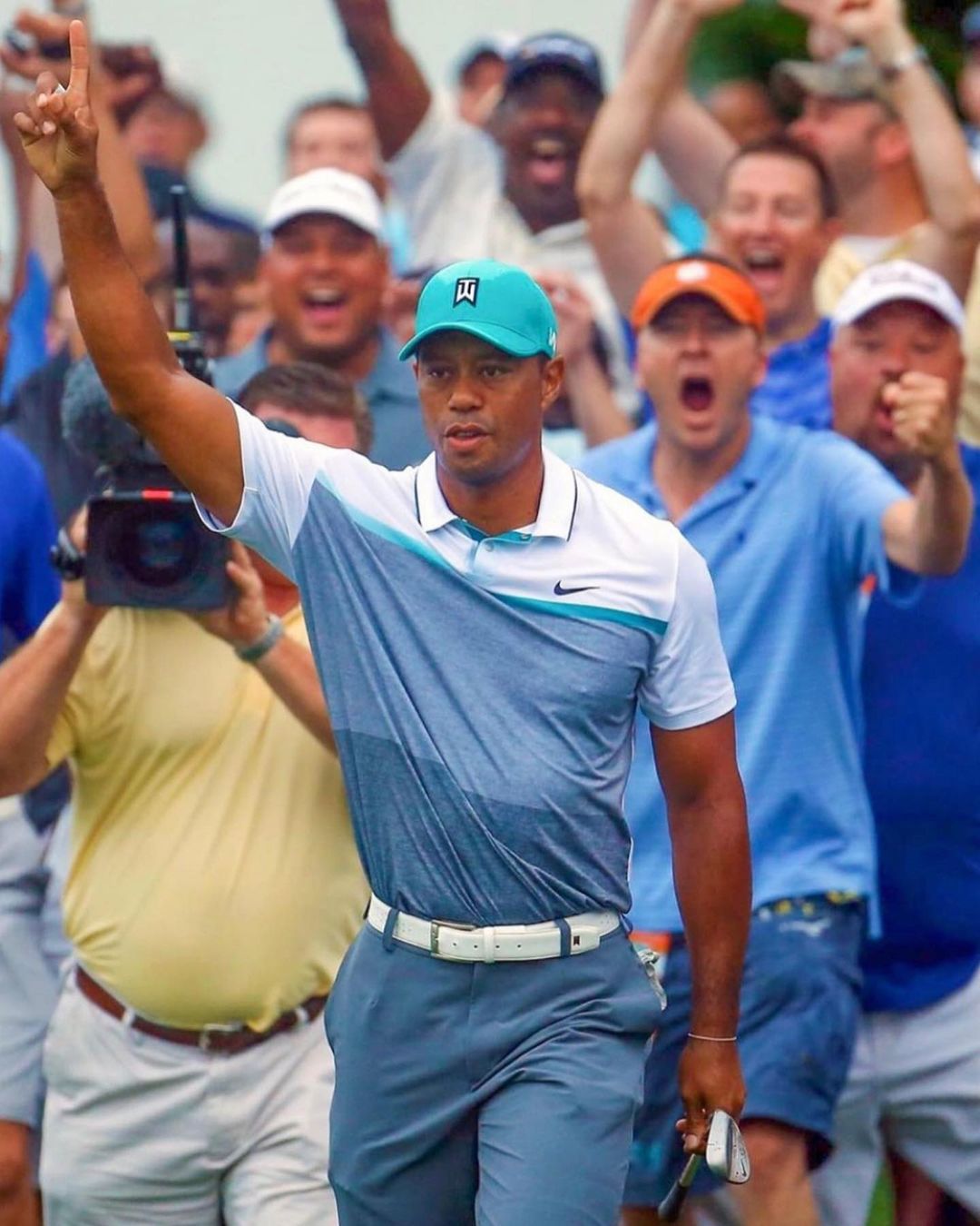 Tiger Woods Holding His Hand Up While Playing Golf. Photo by Instagram user @wyndhamchamp