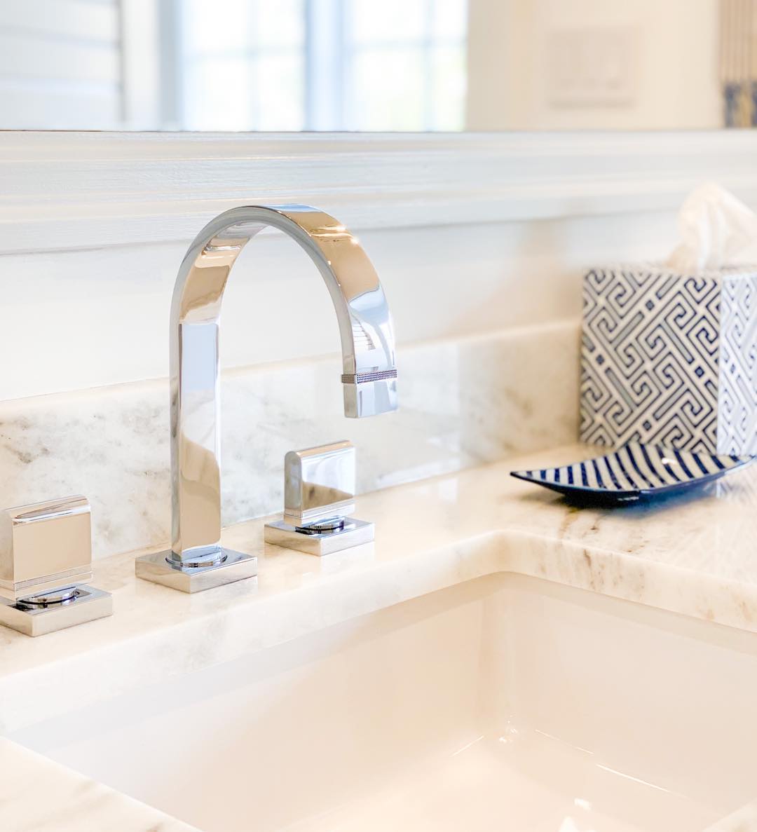 Marble sink with chrome faucet. Photo by Instagram user @summerhilldevelopers