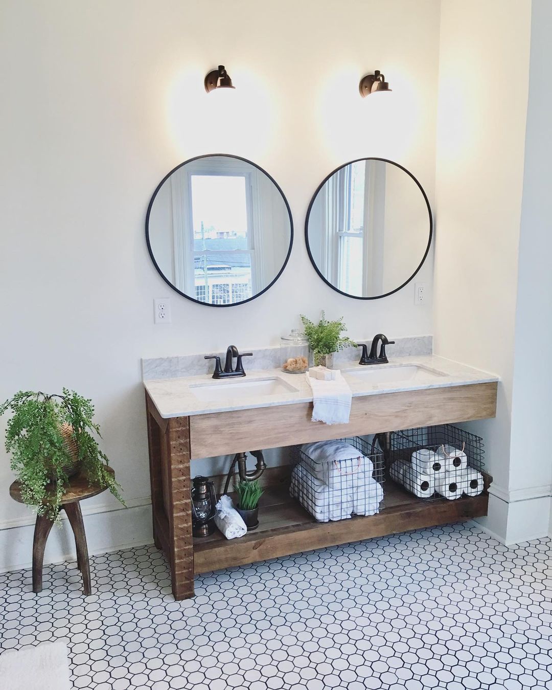 Bathroom with reclaimed wood vanity. Photo by Instagram user @sweetriverdesigns