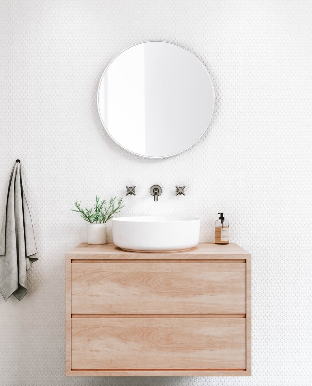 Modern white basin bathroom sink. Photo by Instagram user @abiinteriors