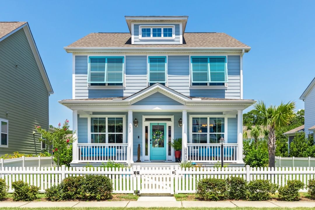 Blue Colonial house in Charleston. Photo by Instagram user @jtproperties