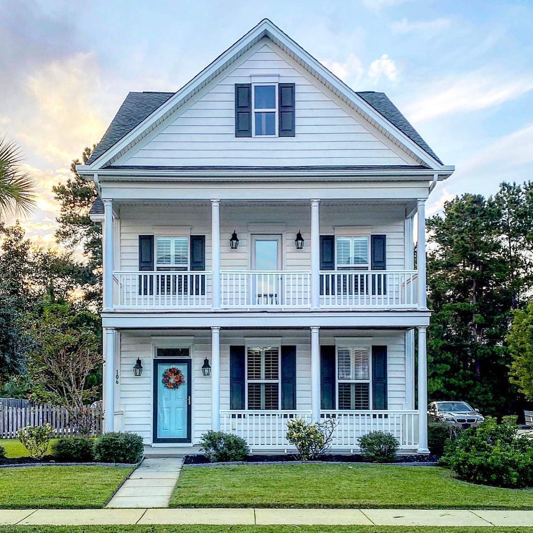 White multi-story home in Summerville, Charleston. Photo by Instagram user @mccrackenproperties