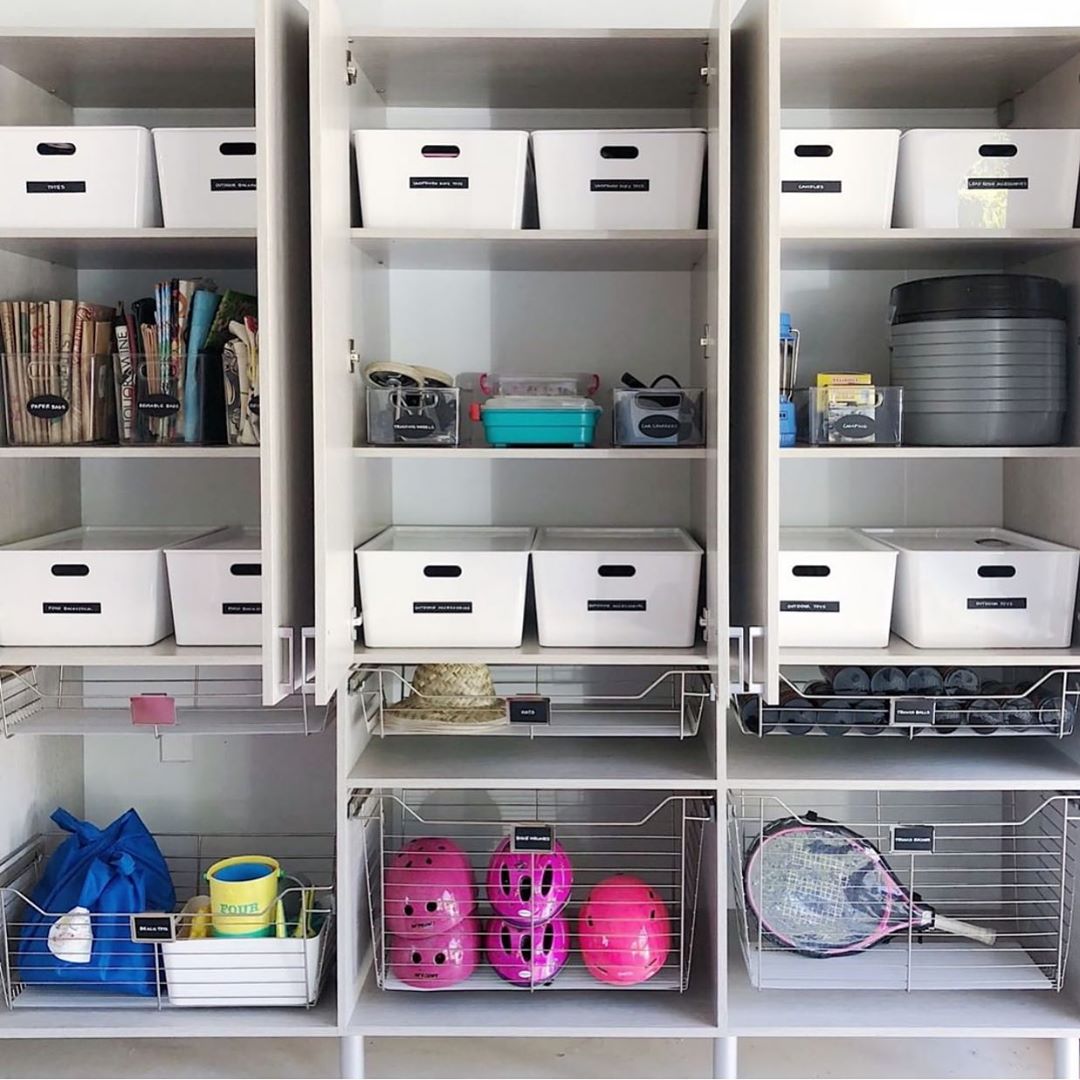 Garage Storage Space with Storage Bins on Shelves. Photo by Instagram user @orderly_inspiration