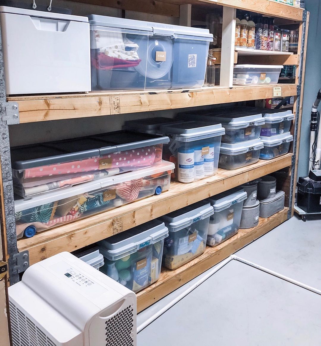 Basement Storage Space with Clear Storage Bins on Shelves. Photo by Instagram User @indianapolisneat