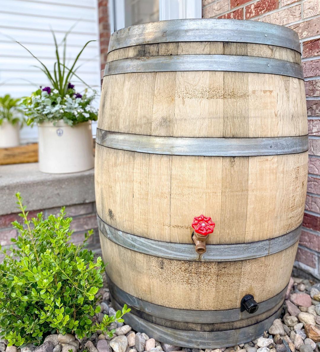 Wooden Barrel Designed to Be an Outdoor Rain Water Catcher. Photo by Instagram user @midwestlifeandstyle