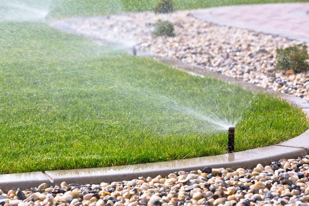 At Home In-Ground Sprinkler System Running. Photo by Instagram user @nelsonlandscapingok