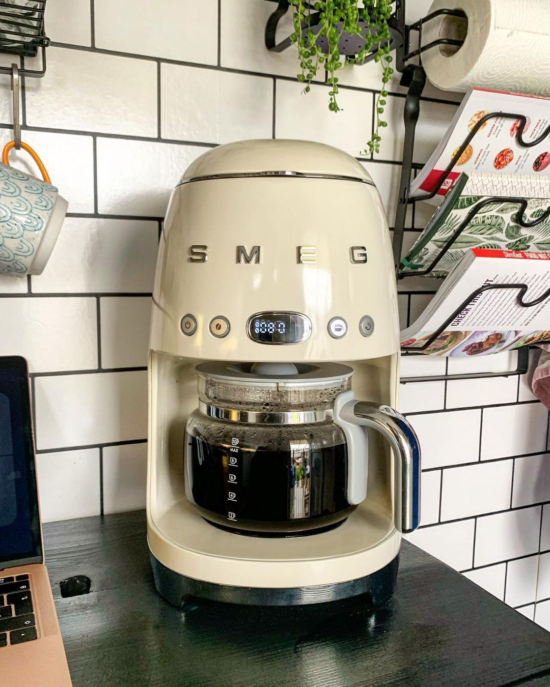 Green Coffee Maker from Smeg. Photo by Instagram user @house_n_hound