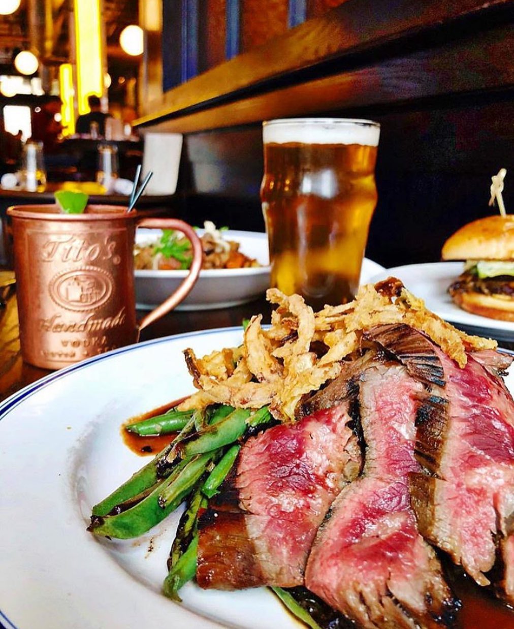 Steak frites with beer and Moscow mule from Butcher's Union. Photo by Instagram user @butchersuniongr