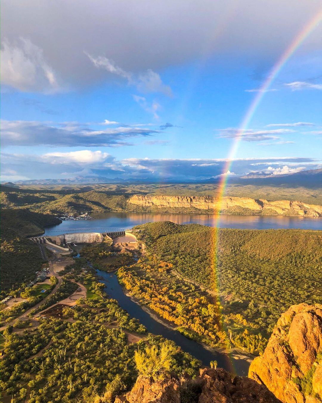 Photo of Saguaro Lake Guest Ranch with a Double Rainbow Visible. Photo by Instagram user @saguarolakeranch