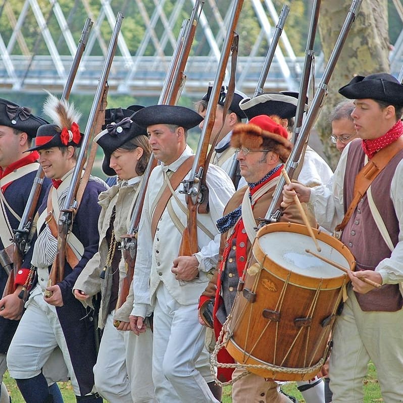 Reenactment of a colonial march in 1775, including costume accuracy, drumbeats, and muskets. Photo by Instagram user @ washingtoncrossingpark