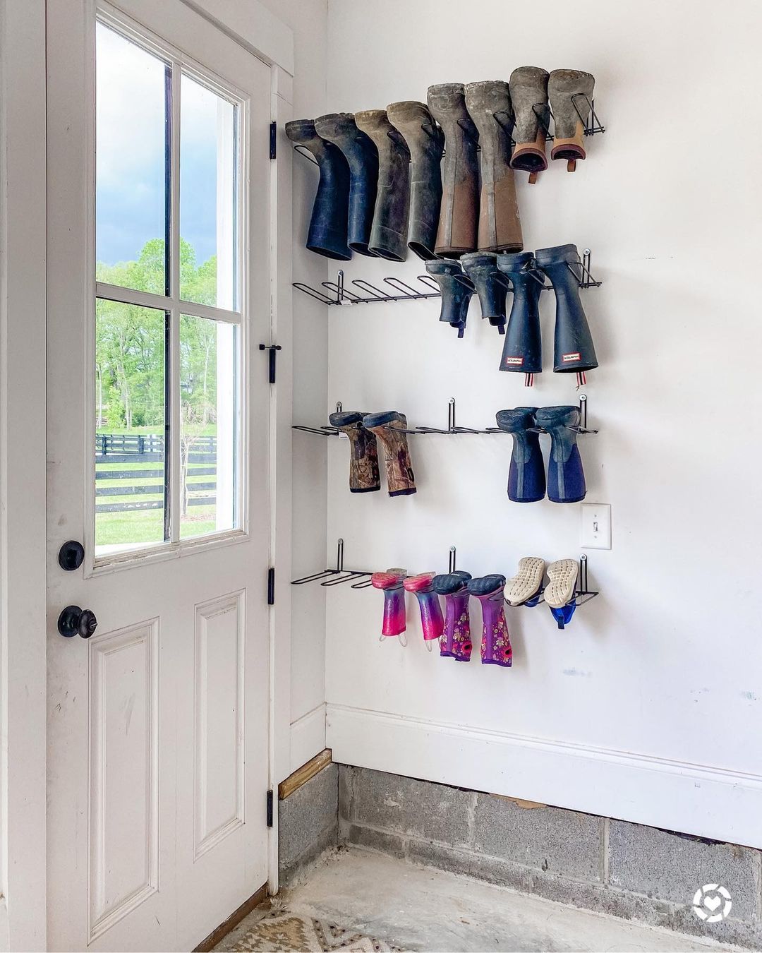 Boot rack hanging in garage.