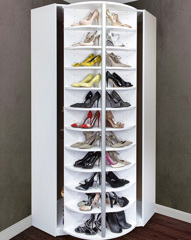 White rotating rack for displaying and storing shoes.
