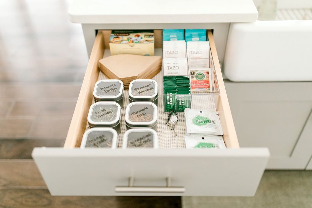 Open drawer with different teabags, and loose-leaf tea in an organized order. Photo by Instagram user @laurendamarie.
