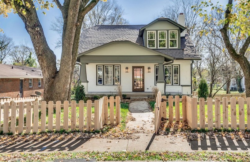 Exterior of white and gray bungalow in Nashville, TN
