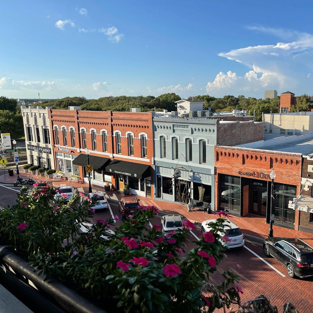 Exterior drone photography of row of businesses in Downtown Plano, Texas
