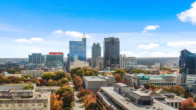 A distant view of the towering buildings in downtown Raleigh. Photo by Instagram user @elancitycenter.