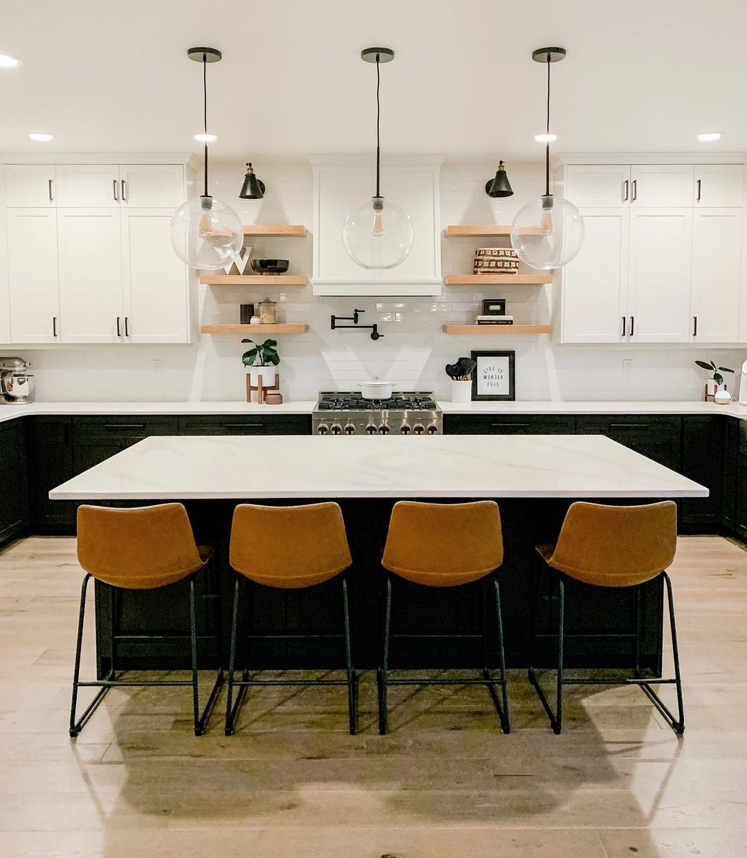 Updated kitchen with clean granite countertops. Photo by Instagram user @becky.weeks