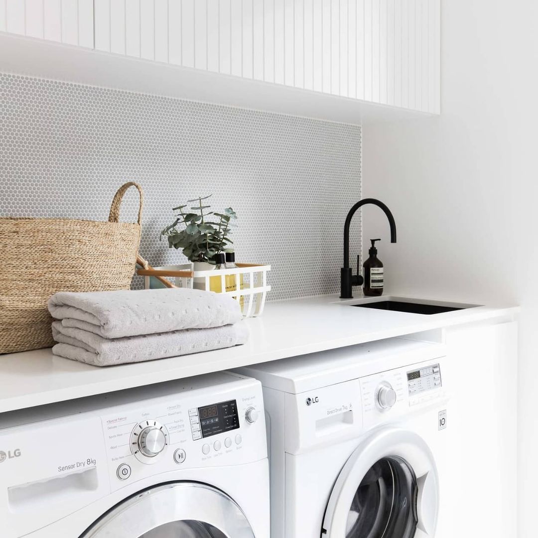 Cleaned up laundry room with large wash sink nearby. Photo by Instagram user @sinkwarehouse