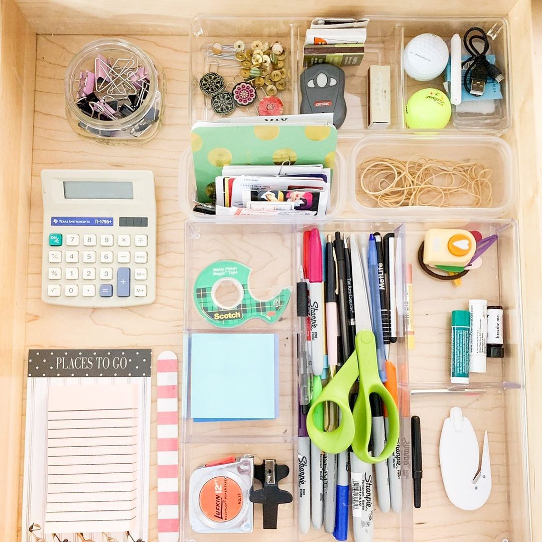 Organized junk drawer with assorted items like tape and scissors. Photo by Instagram user @blissonbeech