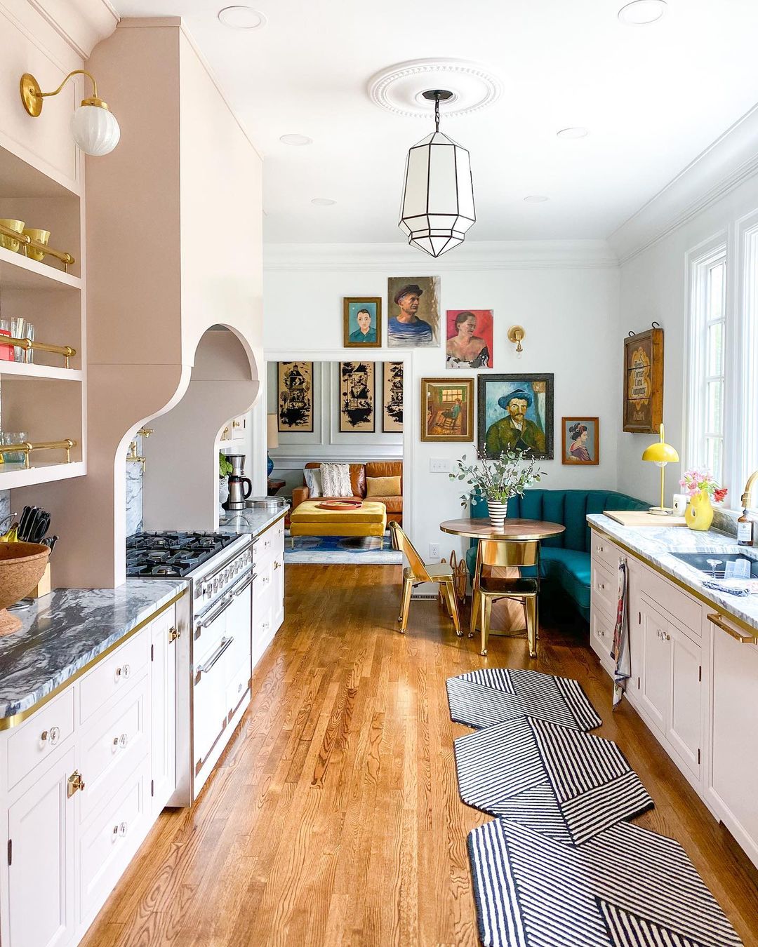 Eclectic galley kitchen design with fun colors and prints. Photo by Instagram User @home_ec_op