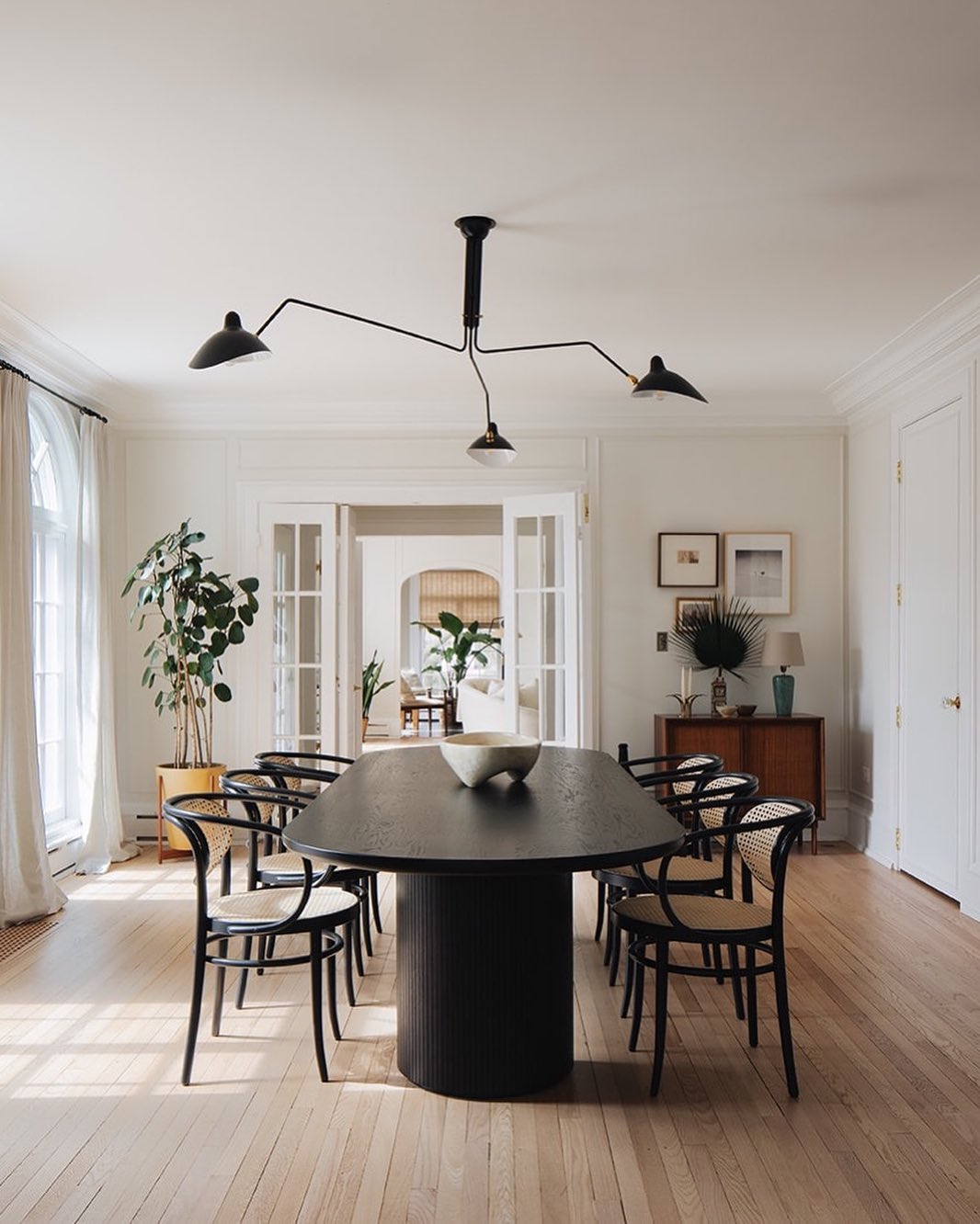 Beautiful dining room in a home with a closed floor plan. Photo by Instagram User @stofferphotographyinteriors