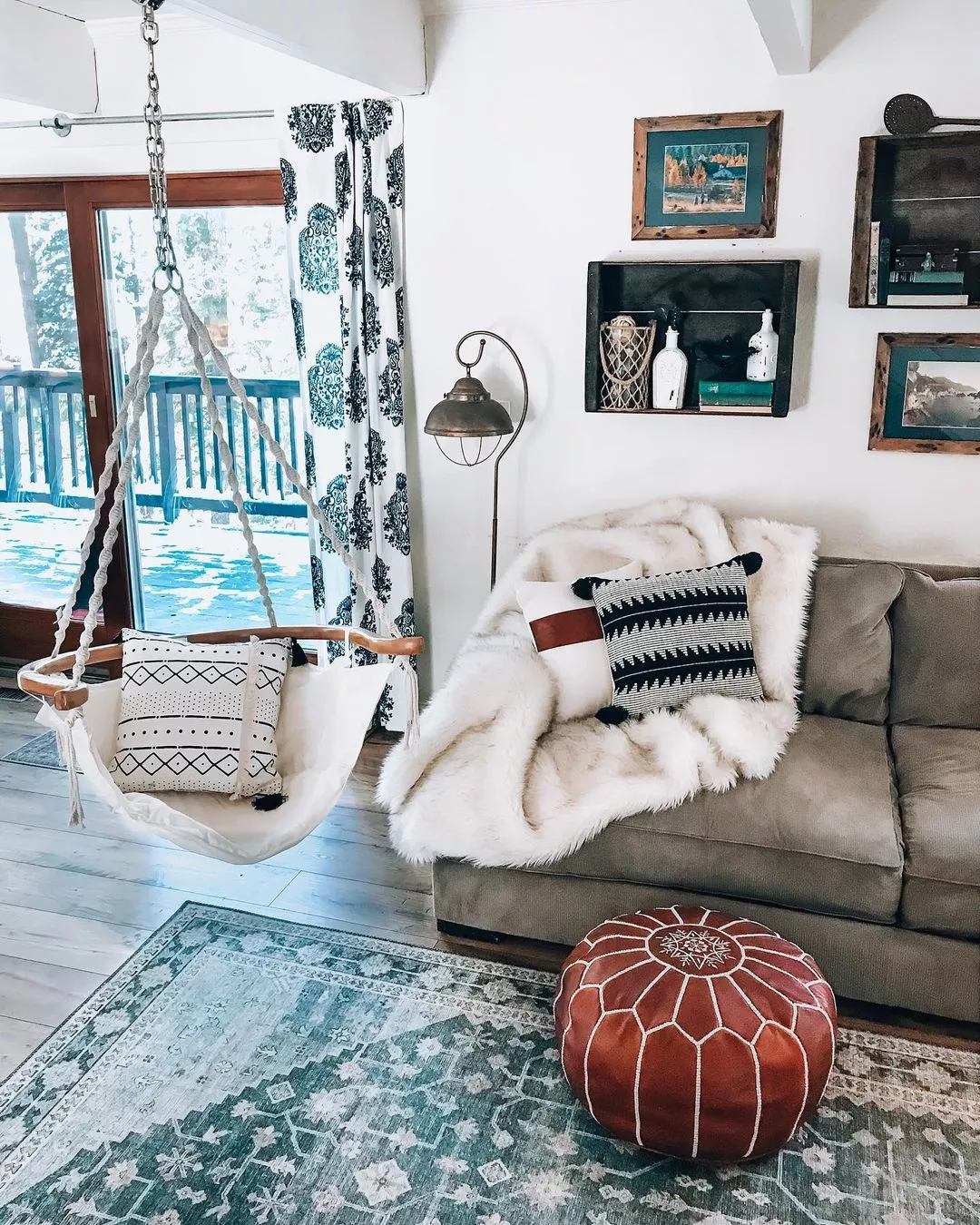 https://www.extraspace.com/blog/wp-content/uploads/2021/02/How-to-Decorate-in-Bohemian-Style-Chill-Out-in-a-Hanging-Chair.jpg.webp