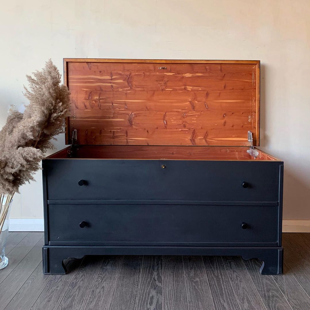 Black painted cedar chest for bedroom storage. Photo by Instagram user @haldimand_vintage